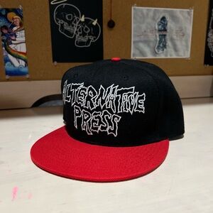 Alternative Press red and black snapback